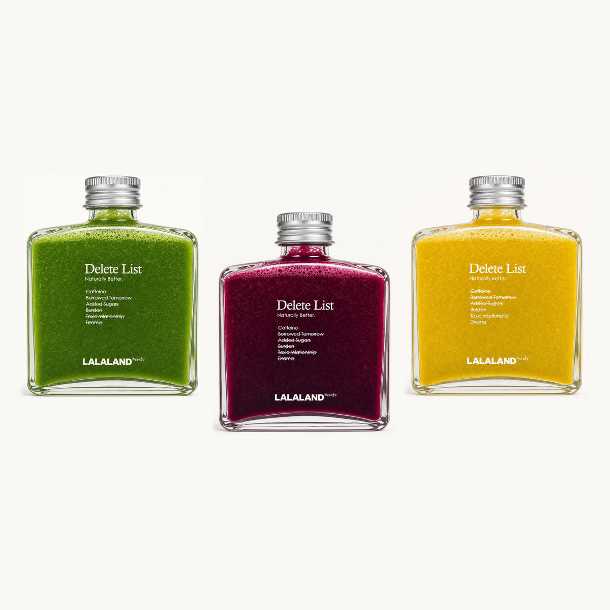 Lalaland® everyday-performance — 3 bottles, single staggered row: green, red, yellow
