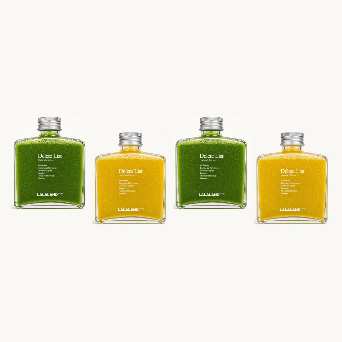 Lalaland® green-turmeric — 4 bottles, single staggered row: green, yellow, green, yellow