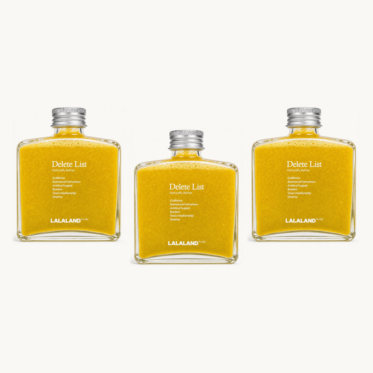 Lalaland® turmeric-triple — 3 bottles, single staggered row: yellow, yellow, yellow
